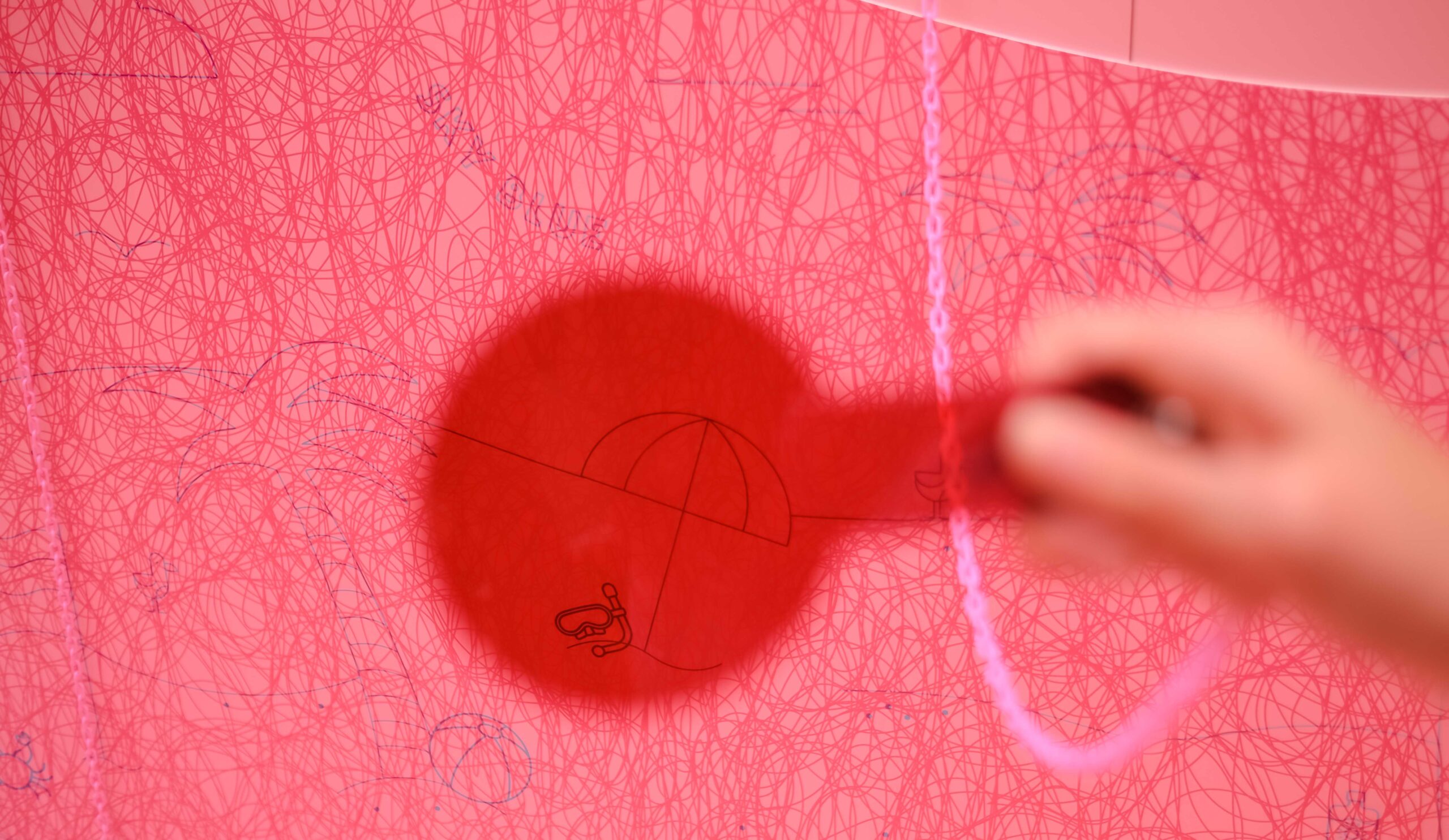 Pink Interactive Discovery Wall with Hidden Drawings for Kids.