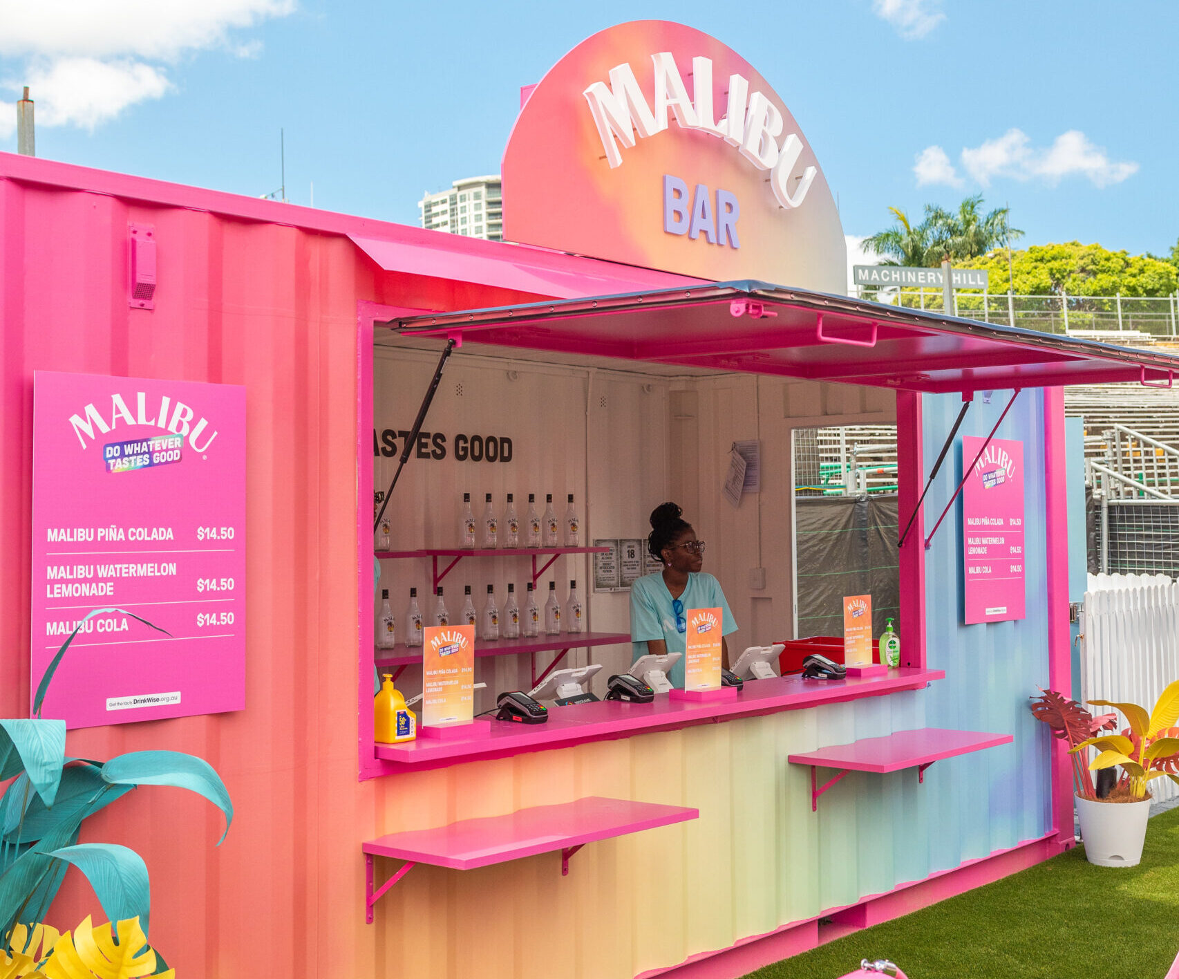 Colourful Container Bar setup for Malibu. At Laneway Festival.